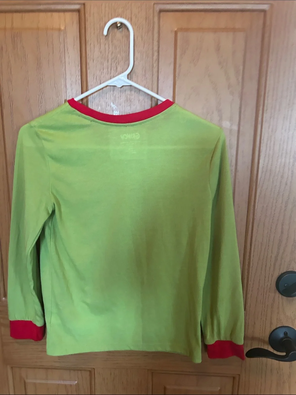Kids' Merry Grinchmas Green Long-Sleeve Pajama Top with Red Trim